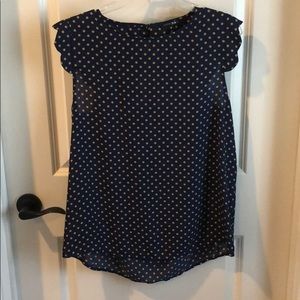 Navy and olive polka dot shirt.